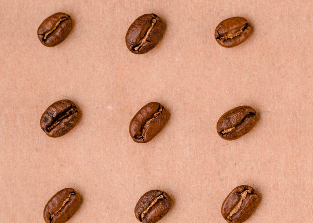 Top view of 9 coffee beans